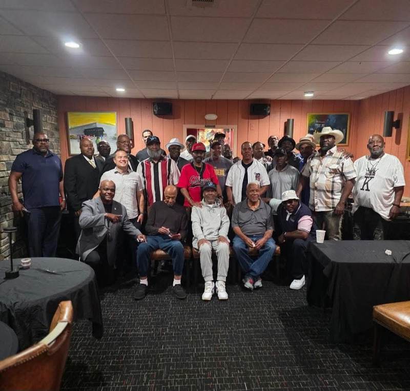 Leon gathering with Flint community members